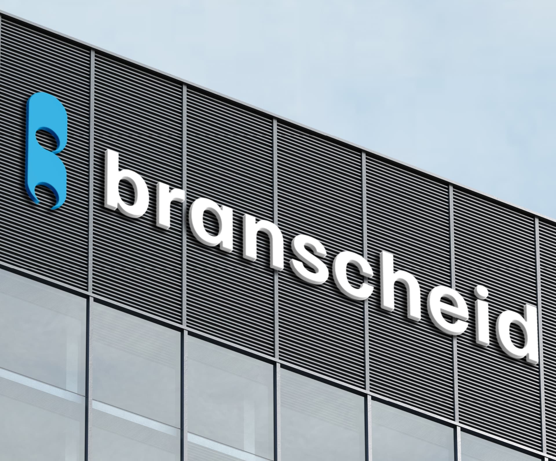 Gebäude mit "Branscheid"-Logo auf Fassade, modernes Design.