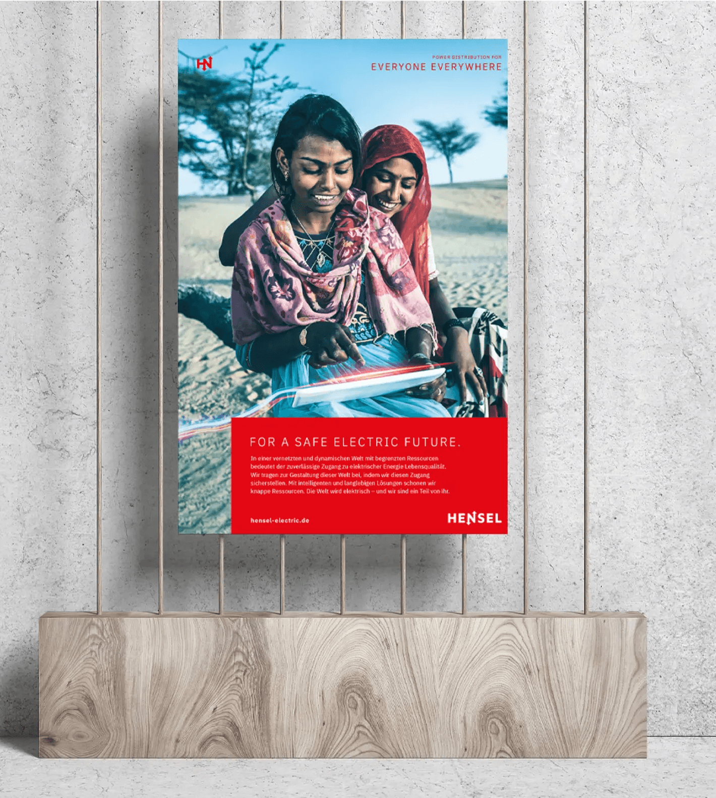 Ein Plakat für HENSEL mit Menschen und Energlinien